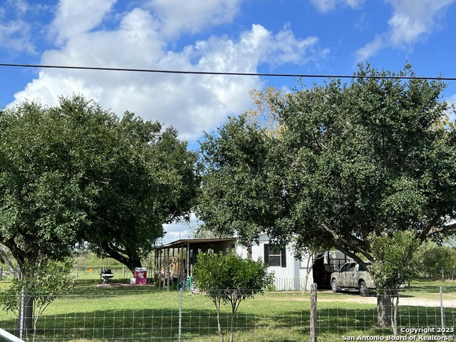 2215 N MADISON AVE, BEEVILLE, TX 78102, photo 1 of 23