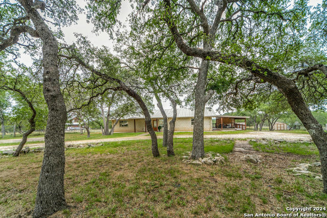 1267 RIVER BEND DR, BLANCO, TX 78606, photo 1 of 25