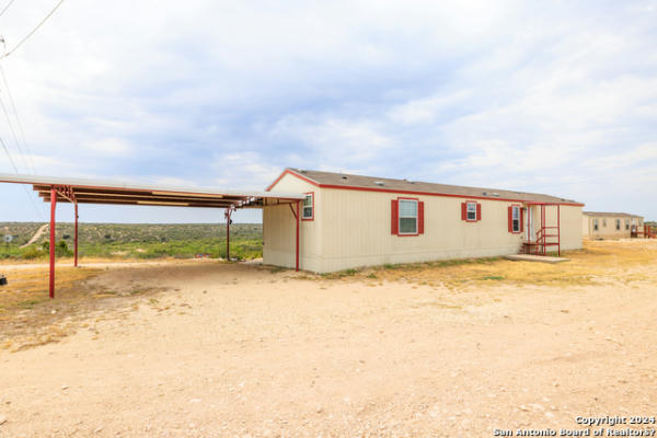 100 RED ROCK RD, OZONA, TX 76943, photo 3 of 50
