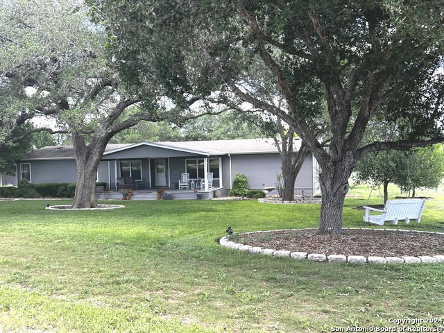 413 PRIVATE ROAD 6255, KARNES CITY, TX 78119, photo 1 of 34